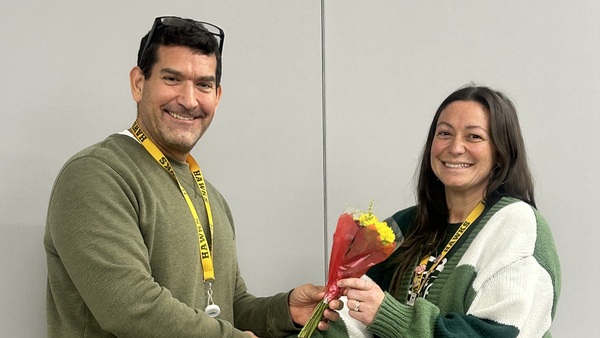 Principal Vitiello congratulates Dr. Carly Stranges on her nomination. 